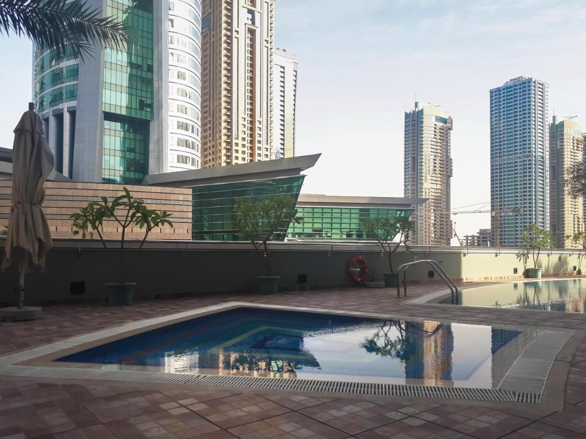 Higuests - Cozy Studio With Panoramic Views On The Lake Daire Dubai Dış mekan fotoğraf